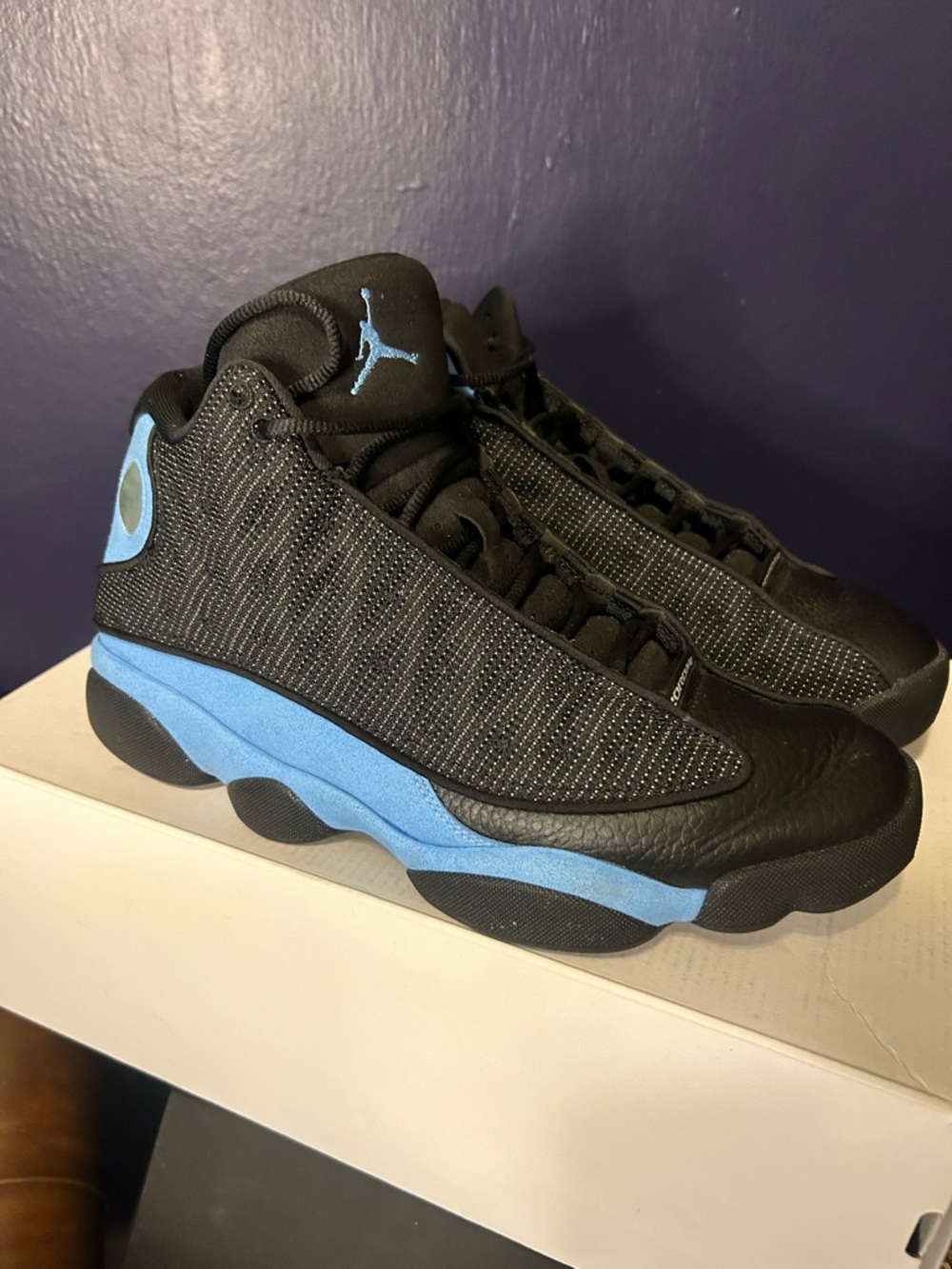 Jordan Retro 13 Black and University Blue Sneakers